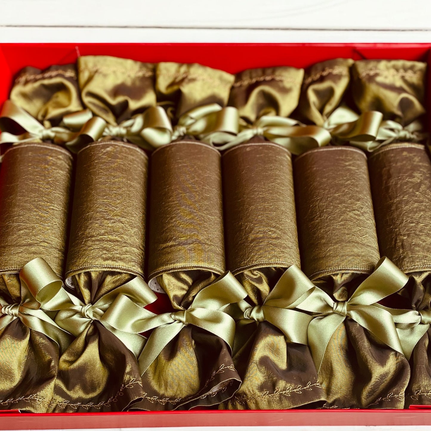 “Set of six St Nicolas Design luxury reusable Christmas crackers, in Olive Green with matching bows in keepsake box, Timeless Celebrations Ireland”