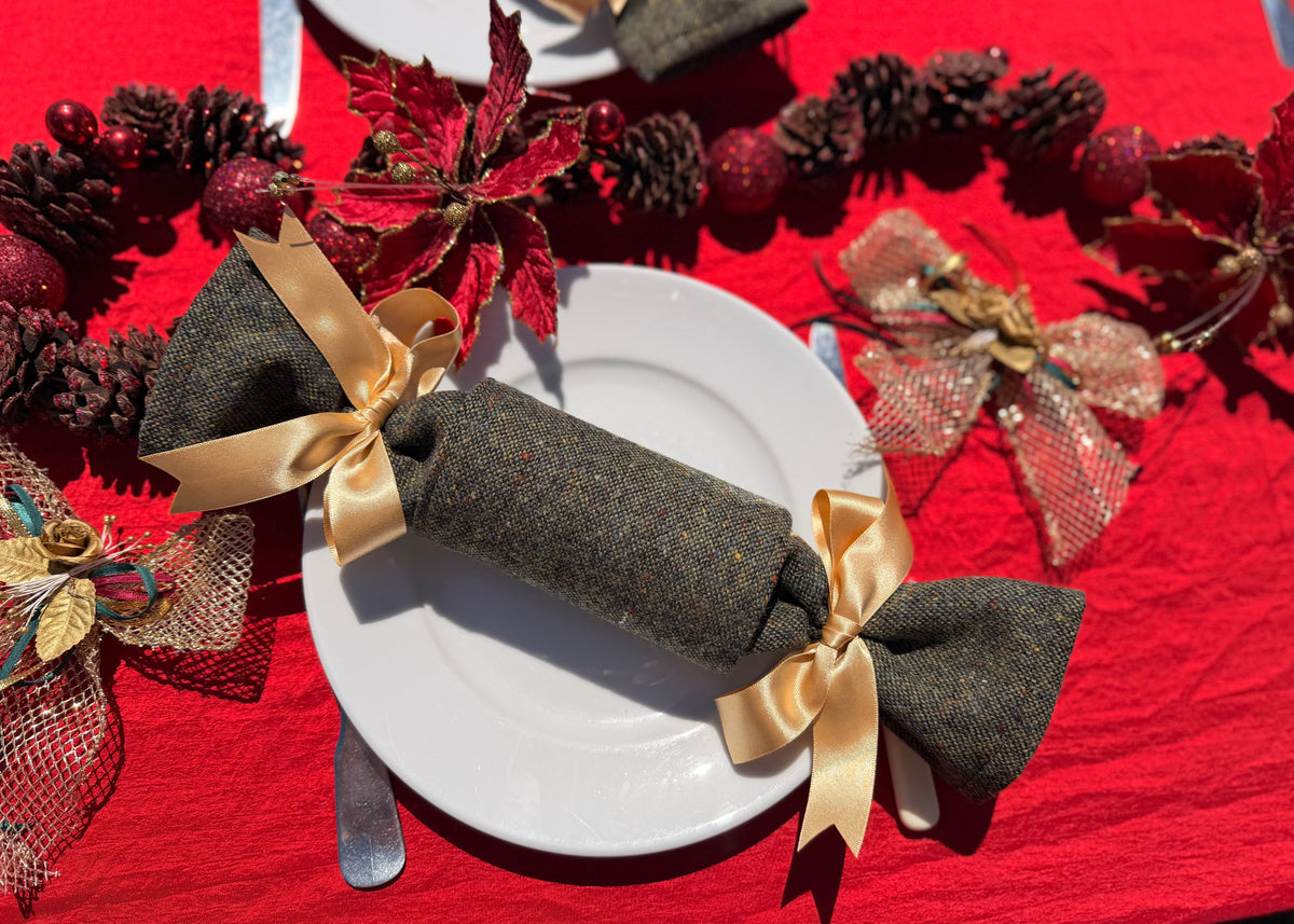 Festive table setting with Luxury reusable Christmas crackers made from Donegal tweed. 