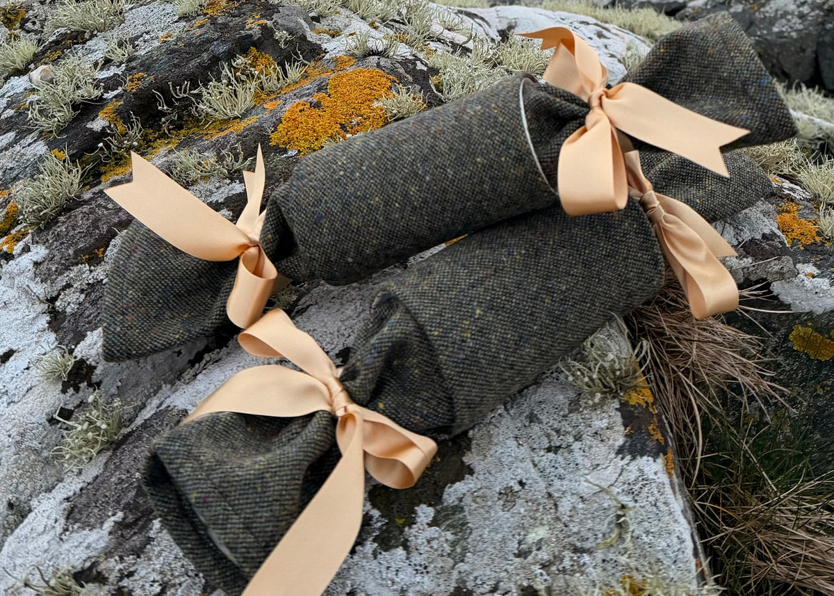 Reusable Chrismtas Cracker handmade in Ireland. Made from Eske - Green Salt & Pepper Donegal Tweed with gold ribbon 