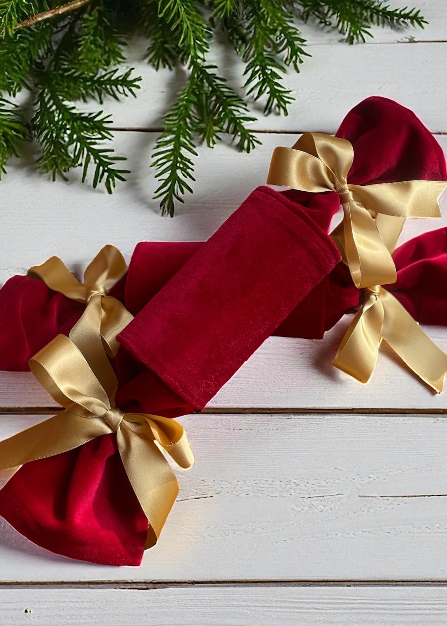 Red velvety Christmas cracker with gold ribbon 