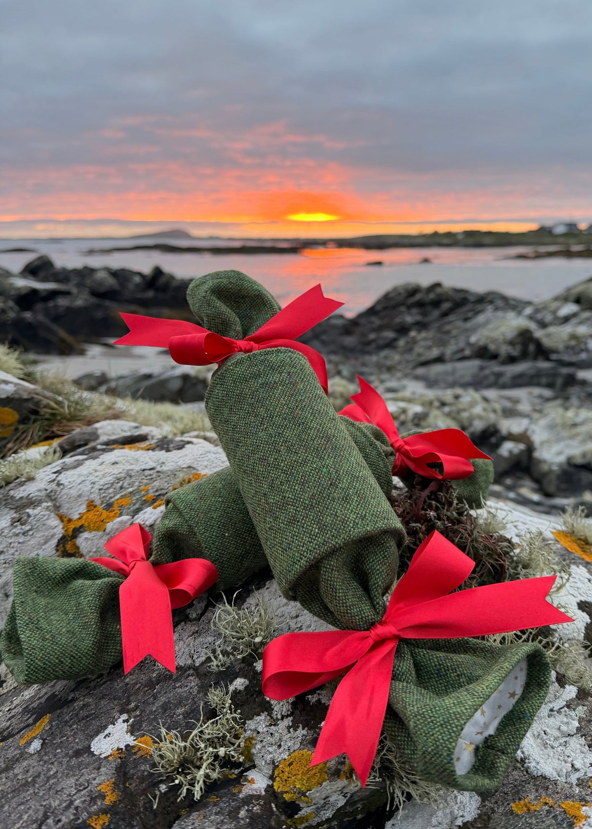 Handcrafted in Ireland, our Yuletide Tweed Christmas Crackers combine the heritage of Irish weaving with the timeless tradition of the Christmas cracker.

Design & Materials

Each cracker is made using authentic Magee Donegal Tweed in Eske – Green Salt & Pepper Flecked Donegal Tweed. The rich green tones and subtle flecking are inspired by the Irish landscape, while luxurious satin ribbon bows add an elegant festive finish.

Reusable, Refillable & Sustainable

